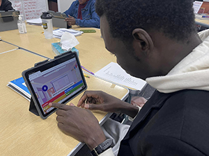 A person works on a tablet